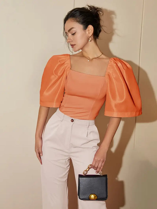 RIEK - Blouse met satijnen pofmouw KONINGSDAG
